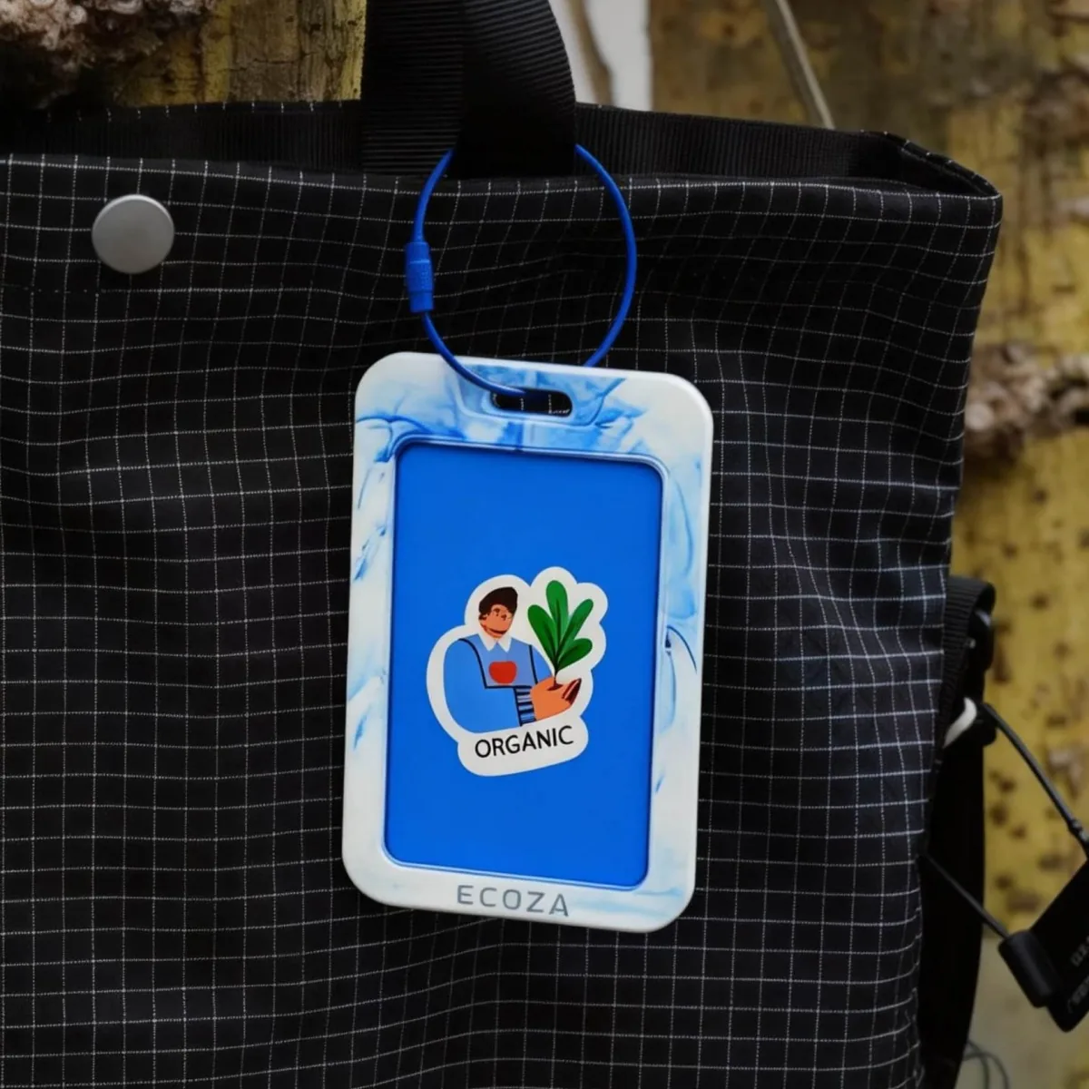 Navio Tag in Arctic Blue, pressed from recycled ocean-plastic bottle caps